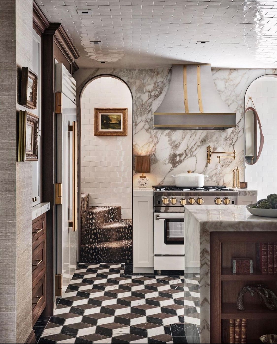 black and white floor tiled kitchen with marble walls