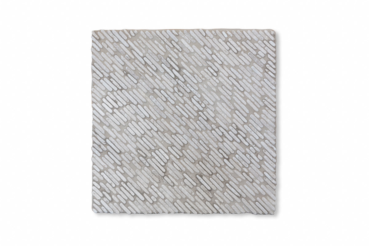 Diagonal Pebble shown in Charcoal Limestone.