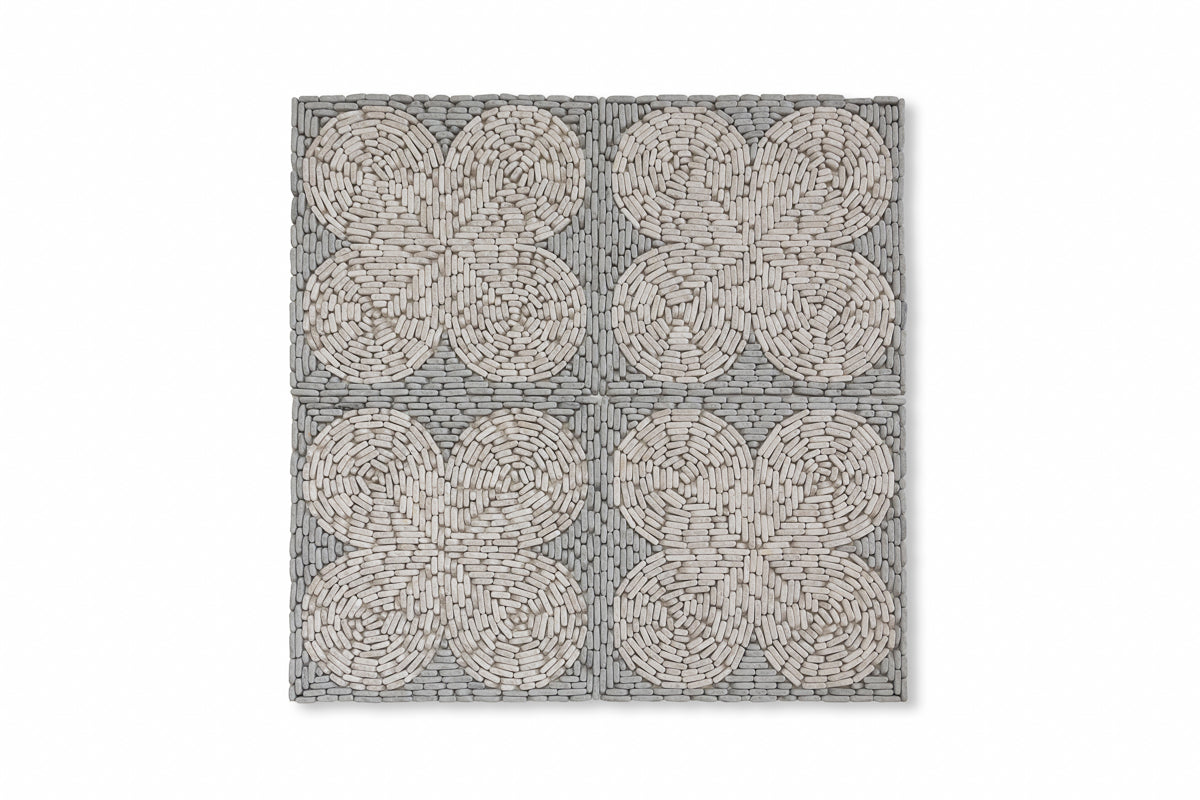 Clovers Pebble shown in Charcoal Limestone and Pearl Marble.