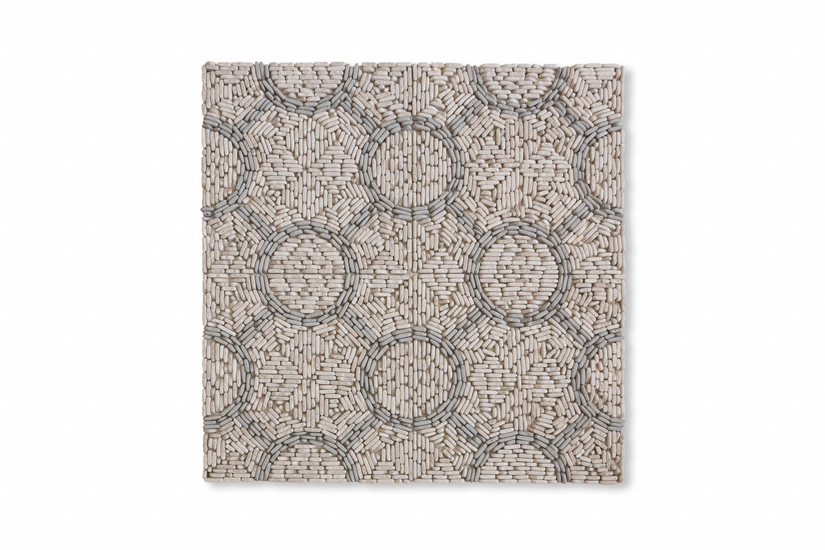 Circulo Pebble shown in Charcoal Limestone and Pearl Marble