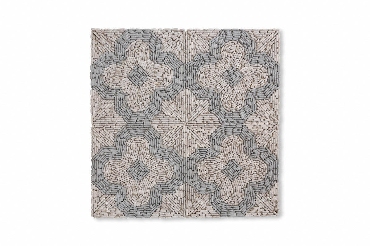 Petunias Pebble shown in Charcoal Limestone and Pearl Marble.