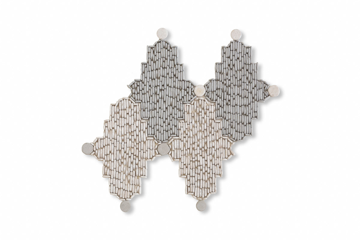 Lattice Pebble shown in Charcoal Limestone and Pearl Marble