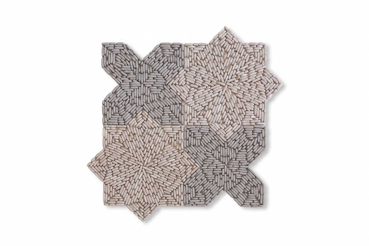 Stargazer Pebble shown in Charcoal Limestone and Pearl Marble