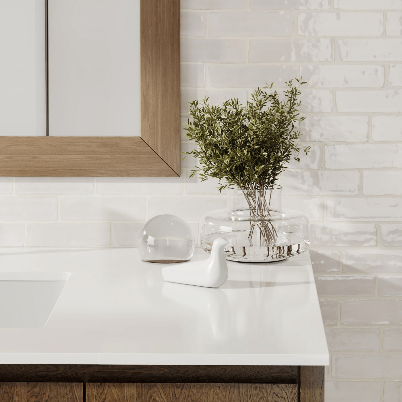 close up of a white marble bathroom sink counter 
