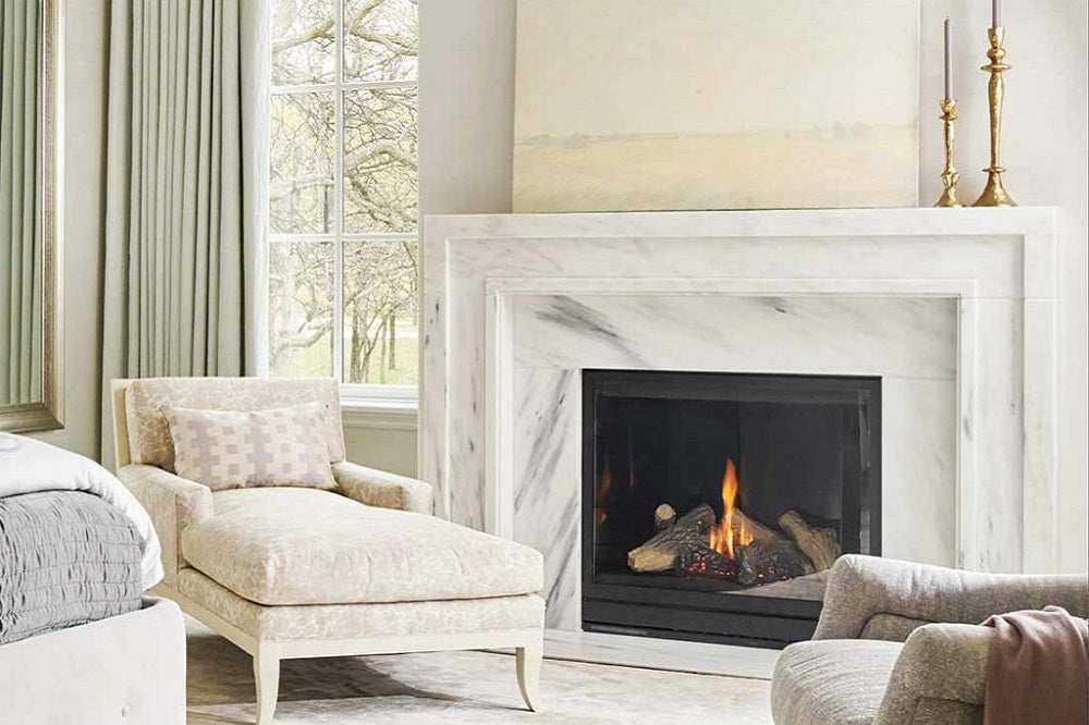 white marbled fireplace in a sitting area