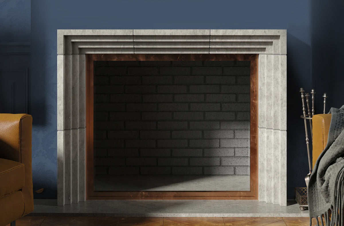 a grey stone fireplace with a blue wall