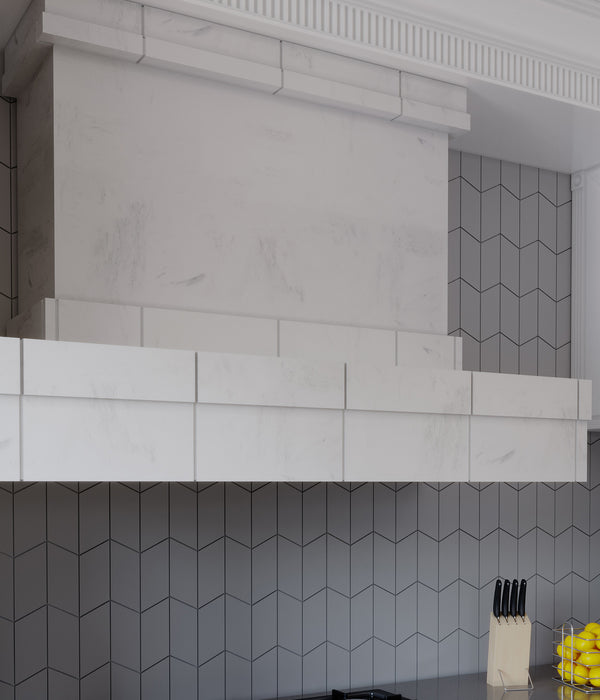 Transitional style kitchen hood in white honed Danby Marble