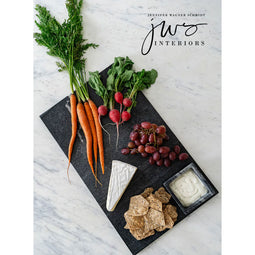 JWS black marble tray with food and dips on it