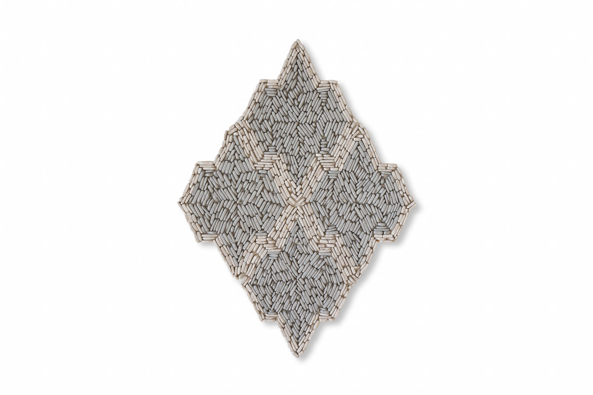 Argyle Pebble shown in Charcoal Limestone and Pearl Marble